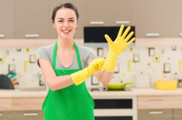 Woman-Green-Apron-Yellow-Rubber-Gloves-Clean-Kitchen